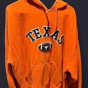 Vibrant Orange and Black Texas Sweater with Bold Text